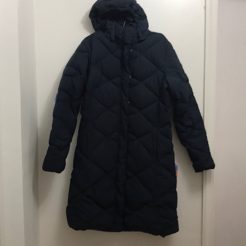 The North Face coat in dark blue color.